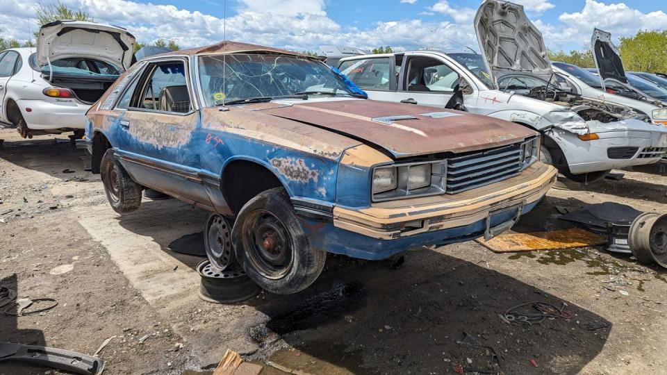 a car with a damaged front end