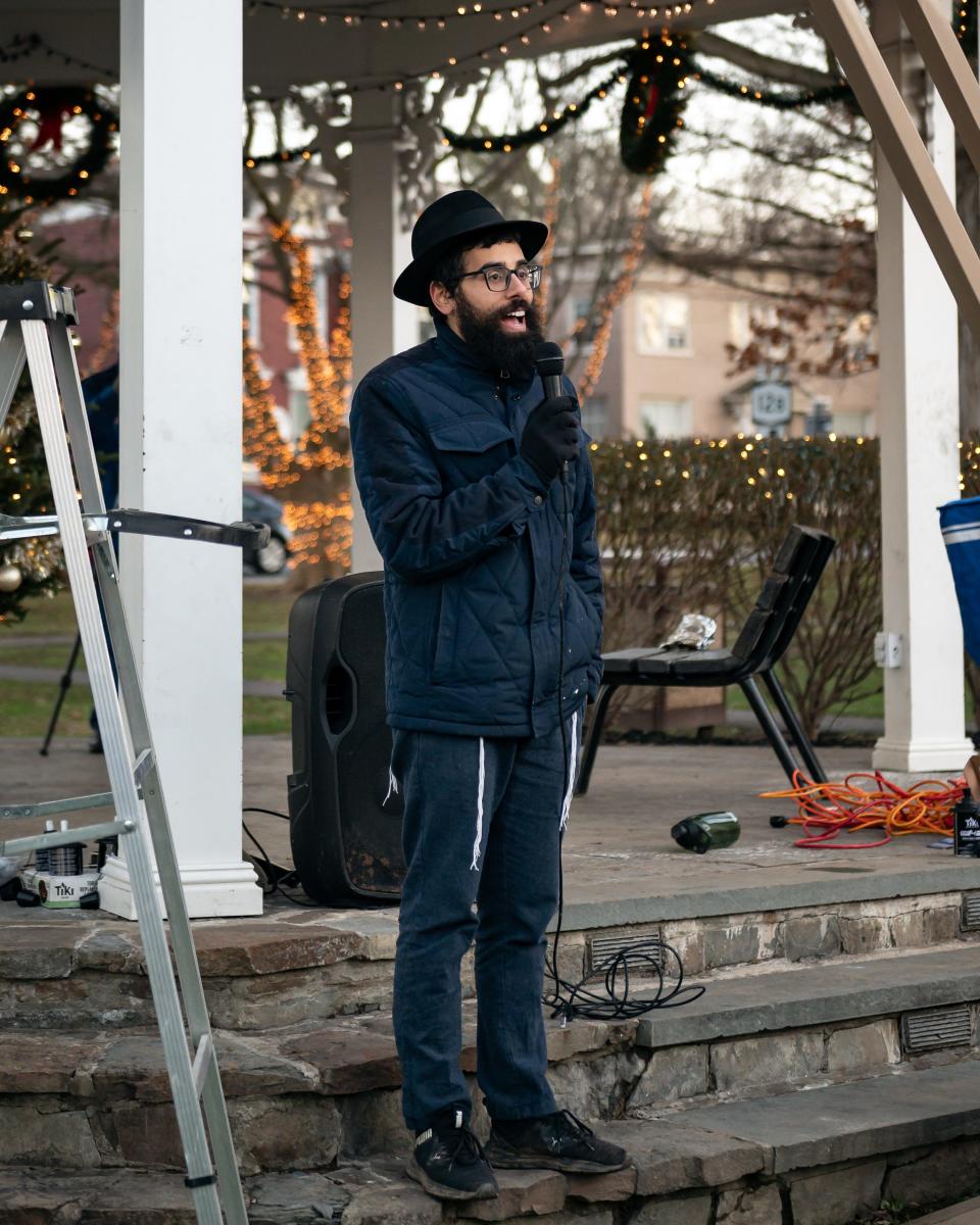 Rabbi Didy Waks from Chabad of Clinton speaks during the annual Menorah Lighting in Clinton, NY on Tuesday, December 12, 2023.