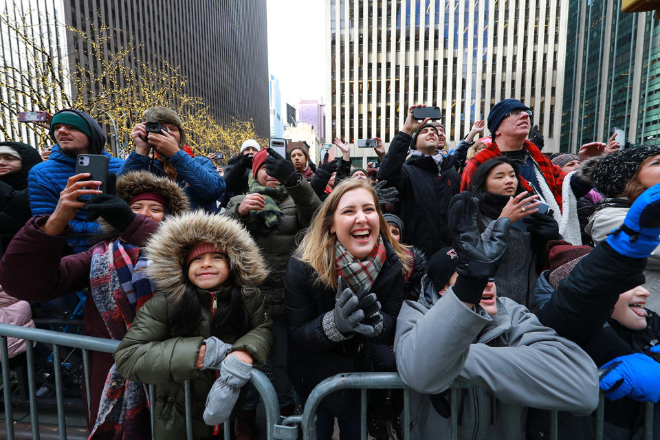 Crowds braved the cold and wind gusts to enjoy the 93rd Macy’s Thanksgiving Day Parade in New York. (Photo: Gordon Donovan/Yahoo News) 