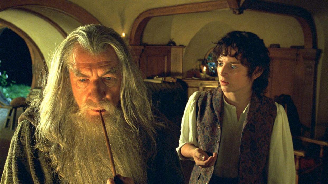 <div>Sir Ian McKellen as Gandalf and Elijah Wood as Frodo in "The Lord of the Rings: The Fellowship of the Ring." (Photo by New Line/WireImage)</div>