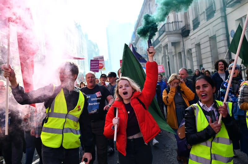 EU supporters, calling on the government to give Britons a vote on the final Brexit deal, attend a 'People's Vote' march in London