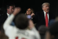 Former President Donald Trump and his wife Melania arrive for Game 4 of baseball's World Series between the Houston Astros and the Atlanta Braves Saturday, Oct. 30, 2021, in Atlanta.(AP Photo/Brynn Anderson)