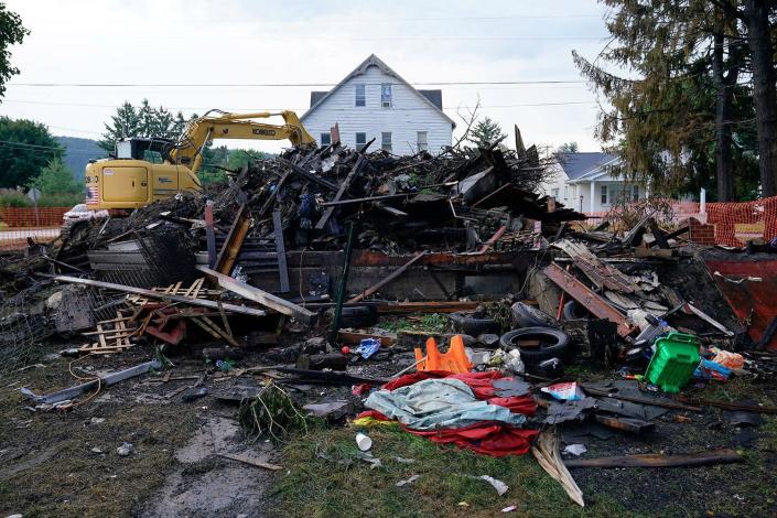 House that was destroyed by a fatal fire is viewed in Nescopeck, Pa.