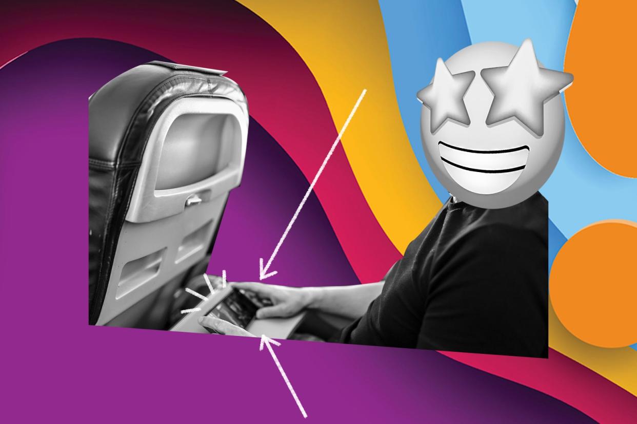 A person with a star-eyed emoji for a head looking at their phone on a flight.