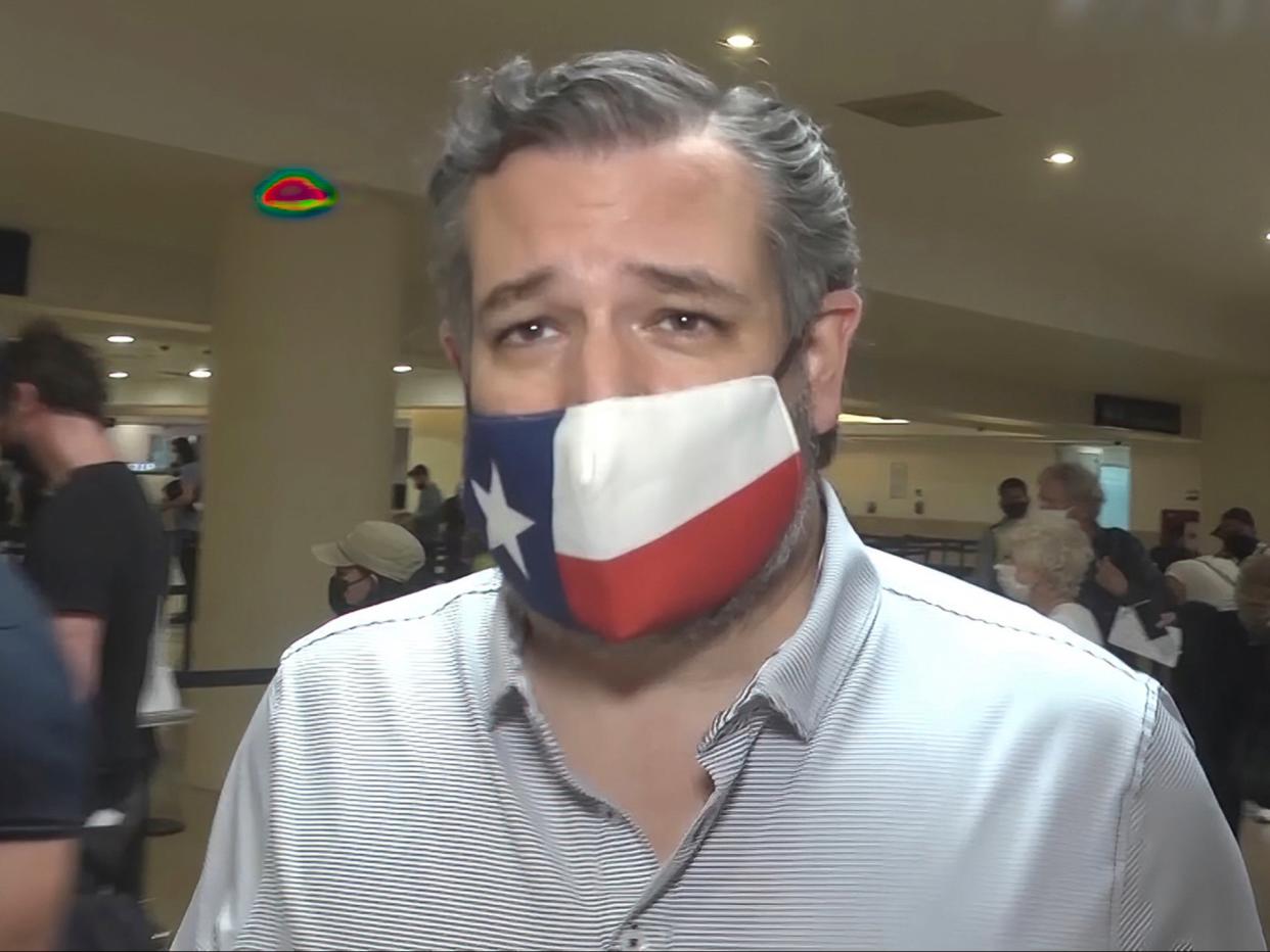 <p>In this image from video, Sen. Ted Cruz, walks to check in for his flight back to the US, at Cancun International Airport in Cancun, Mexico, on Thursday 18 February 2021</p> ((Associated Press))