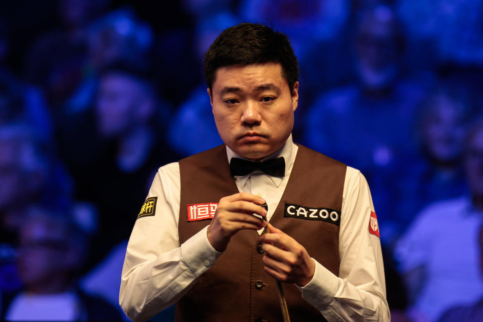 CHELTENHAM, ENGLAND - SEPTEMBER 28: Ding Junhui of China chalks the cue in the third round match against Mark Williams of Wales on day 4 of the 2023 Cazoo British Open at the Centaur on September 28, 2023 in Cheltenham, England. (Photo by VCG/VCG via Getty Images)