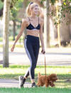 <p>Victoria's Secret model Devon Windsor steps out on Tuesday in L.A. to walk her dog. </p>