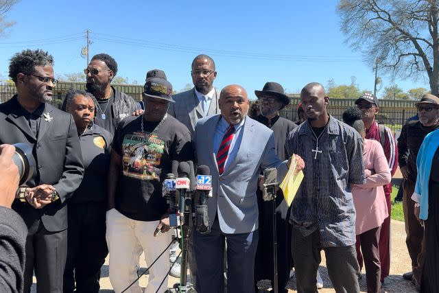 <p>Emily Palmer</p> Lawyer Trent Walker (C) between Eddie Parker (L) and Michael Jenkins (R). Malik Shabazz, who also represents the two men, is standing behind Walker at a press conference in Jackson, Miss. March 18.