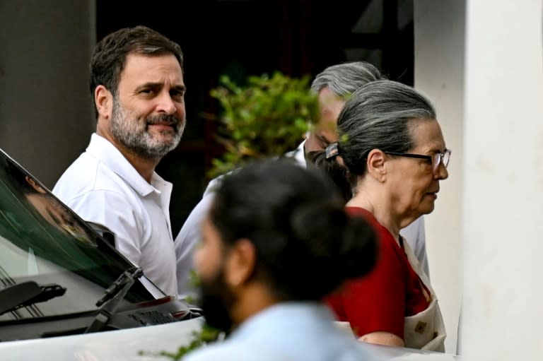 Rahul Gandhi (L) is the scion of a dynasty that dominated Indian politics for decades (Money SHARMA)