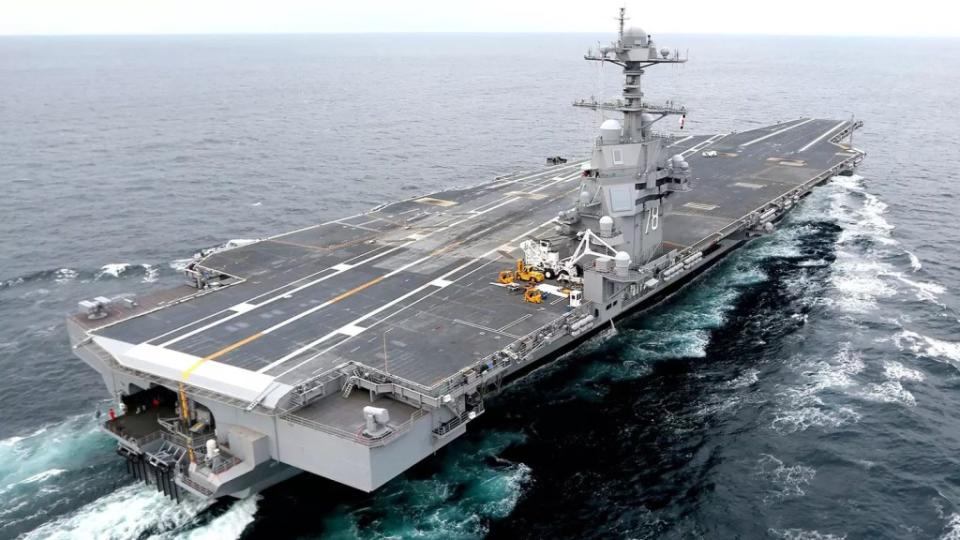 USS <em>Gerald R. Ford</em> with its deck devoid of aircraft during initial sea trials. This was the first carrier to be fitted with EMALS. <em>USN</em>