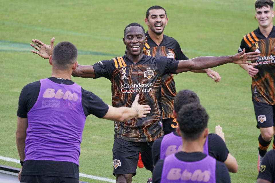 Houston Dynamo defender Maynor Figueroa, center, celebrates after scoring a goal against Nashville SC during the second half of an MLS soccer match Saturday, Sept. 26, 2020, in Nashville, Tenn. The game ended in a 1-1 draw. (AP Photo/Mark Humphrey)