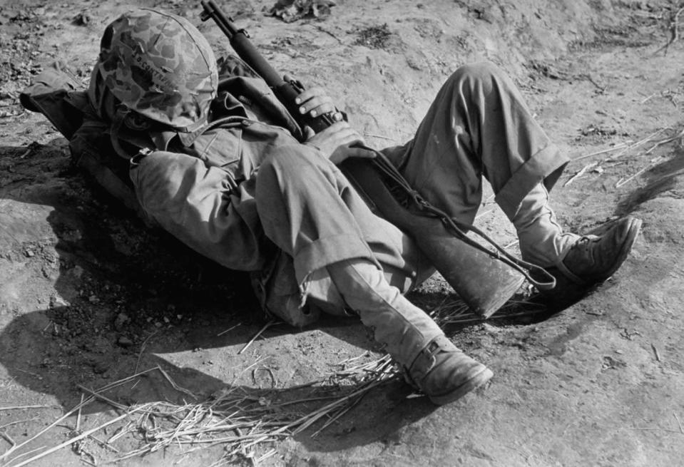 Not originally published in LIFE. An American military man takes a nap, Korea, 1951. Carl Mydans—Time & Life Pictures/Getty Images