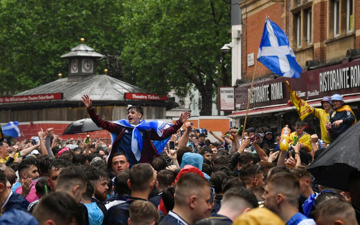 Scotland fans gathered in masse in London spaces including Leicester Square ahead of the Euro 2020 match against England at Wembley - Albert Pezzali/AP