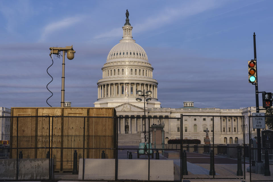 Security fencing and video surveillance equipment has been installed around the Capitol in Washington, Thursday, Sept. 16, 2021, ahead of a planned Sept. 18 rally by far-right supporters of former President Donald Trump who are demanding the release of rioters arrested in connection with the 6 January insurrection. (AP Photo/J. Scott Applewhite)