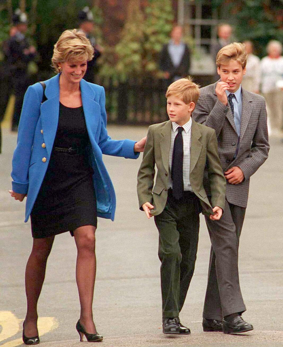 Prince William with Diana, Princess of Wales, and Prince Harry on the day he arrived at Eton in September 1995. (Photo by Anwar Hussein/WireImage)