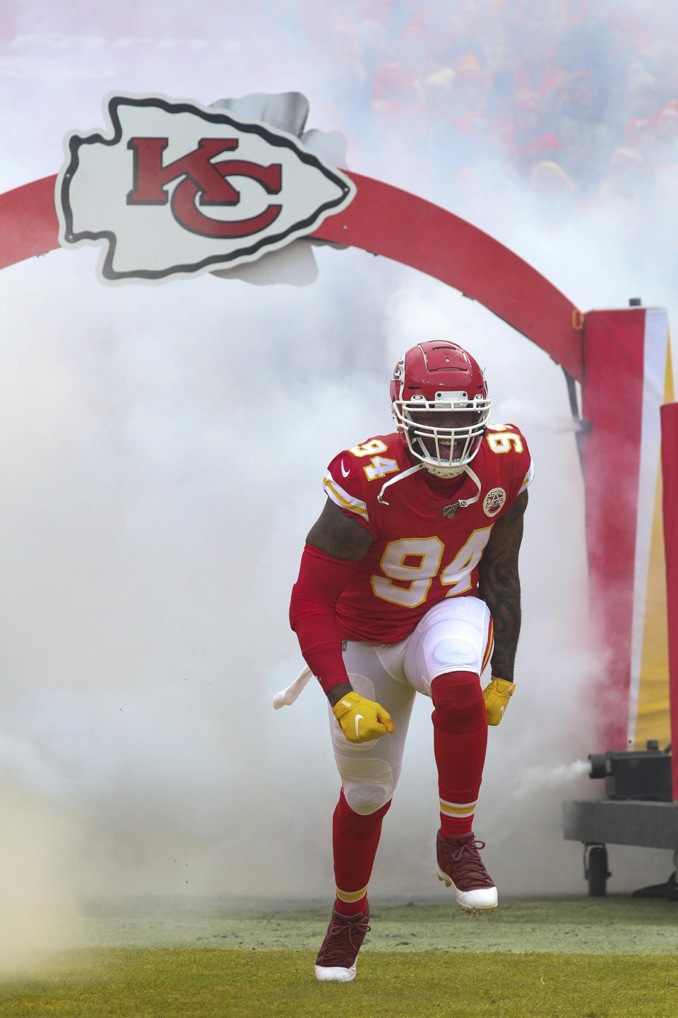 Kansas City Chiefs outside linebacker Terrell Suggs (94) celebrates as he enters the field prior to an NFL divisional playoff game against the Houston Texans, Sunday, Jan. 12, 2020 in Kansas City. The Chiefs defeated the Texans 51-31 (Margaret Bowles via AP)