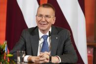 Newly elected Latvian President Edgars Rinkevics speaks to the media after lawmakers elected him in the Saeima, the Latvian Parliament in Riga, Latvia, Wednesday, May 31, 2023. Latvian lawmakers on Wednesday picked the country’s long-serving and popular foreign minister, a strong backer of Ukraine, as its new head of state in a tight vote. (AP Photo/Roman Koksarov)