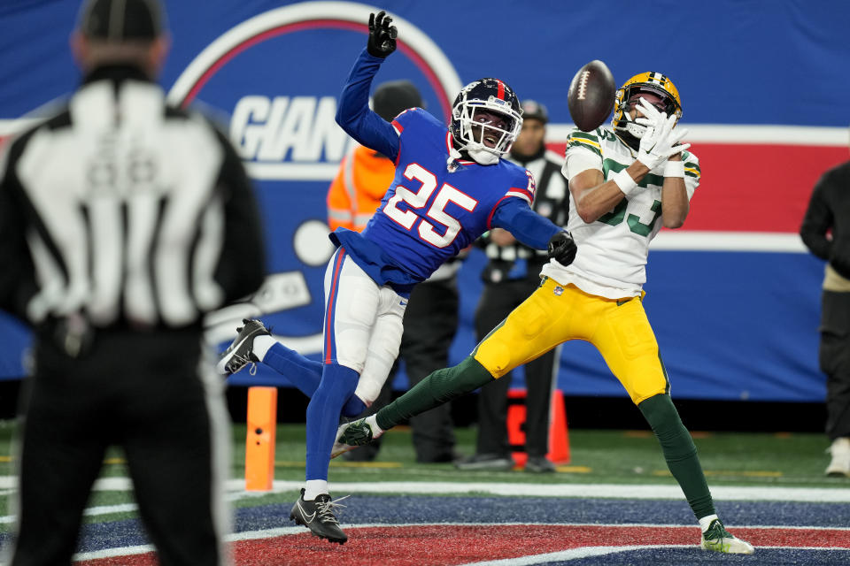 New York Giants cornerback Deonte Banks (25) breaks up a pass in the end zone intended for Green Bay Packers wide receiver Samori Toure (83) during the fourth quarter of an NFL football game, Monday, Dec. 11, 2023, in East Rutherford, N.J. (AP Photo/Seth Wenig)