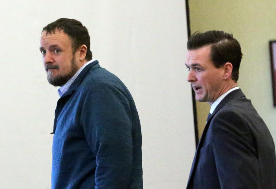 Defendant Timothy Verrill, left, and attorney Matthew McNicoll leave the courtroom at Strafford County Superior Court in Dover Tuesday, April 2, 2024.