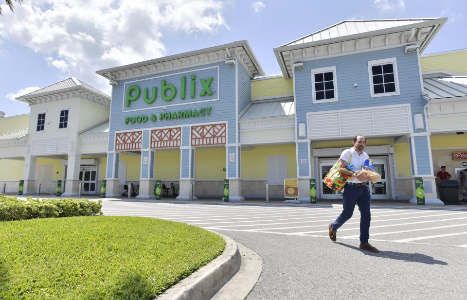 Shopper Tucker Juan leaves the Publix in Neptune Beach on Wednesday, Aug. 9, 2023, where a single winning ticket for the $1.58 billion Mega Millions lottery jackpot was sold at 630 Atlantic Blvd.