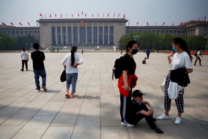 Visitor are seen on Tiananmen Square in Beijing