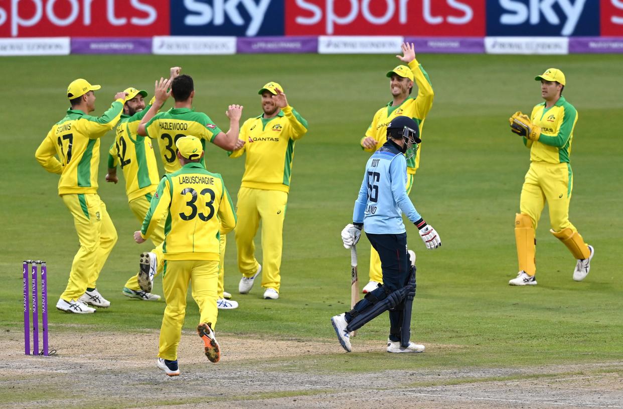 Josh Hazlewood celebrates taking the wicket of Joe Root (PA)