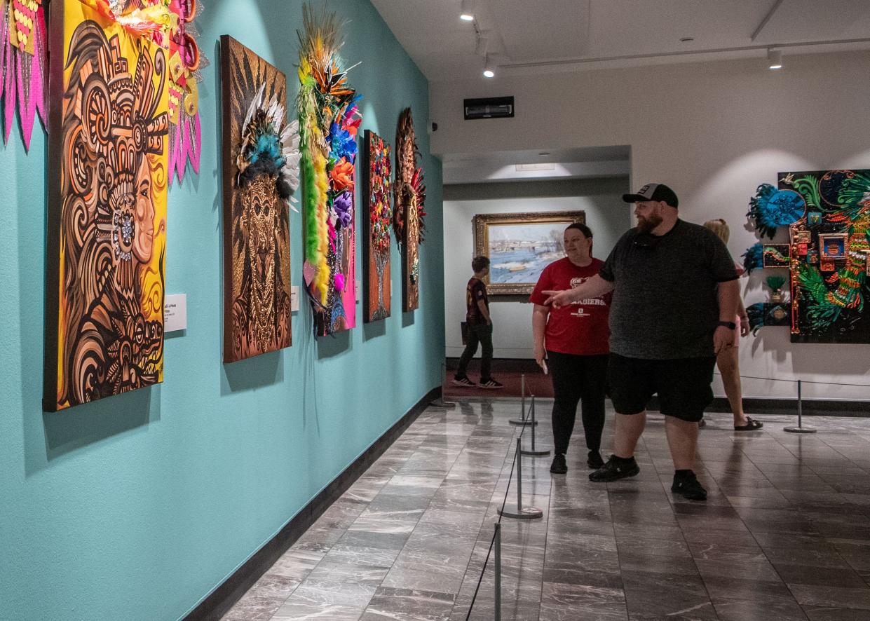 Ashley Prather and Stephen Prather look at new artwork created by José Véra González exhibited inside the ‘Repatriation and Its Impact’ at The Parthenon in Nashville, Tenn., Friday, May 3, 2024.