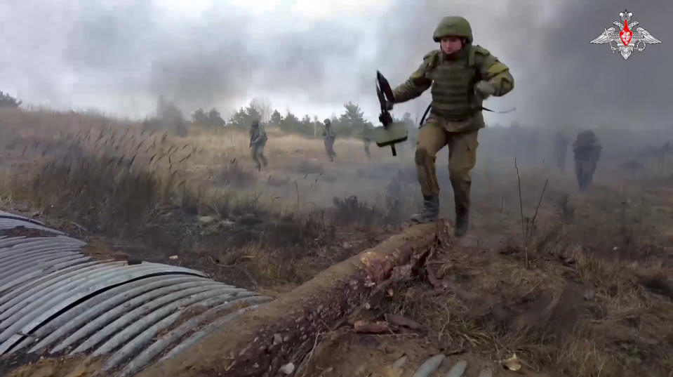 FILE - In this photo taken from video released by the Russian Defense Ministry Press Service on Saturday, Nov. 12, 2022, Russian troops attend combat training at a Belarusian military firing range. Belarus President Alexander Lukashenko has welcomed thousands of Russian troops to his country, allowed the Kremlin to use it to launch the invasion of Ukraine on Feb. 24, 2022, and offered to station some of Moscow’s tactical nuclear weapons there. But he has avoided having Belarus take part directly in the fighting – for now. (Russian Defense Ministry Press Service via AP, File)