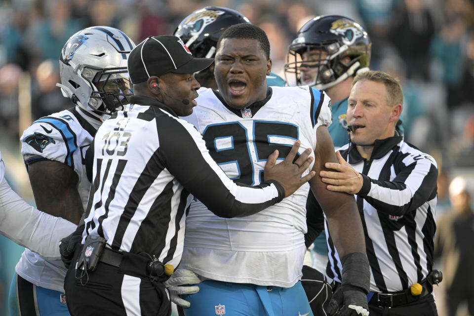 Carolina Panthers defensive tackle Derrick Brown is ejected from the game during the second half of an NFL football game against the Jacksonville Jaguars Sunday, Dec. 31, 2023, in Jacksonville, Fla. (AP Photo/Phelan M. Ebenhack)
