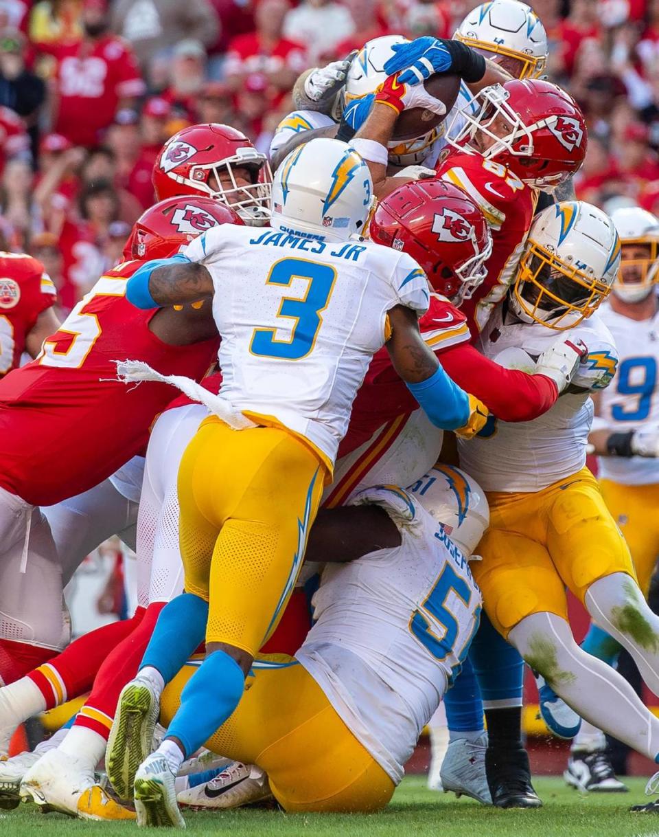 In the third frame in the series, we start to see Kelce’s face and his determined expression. At this point the Chargers player on the other side of the pile has his hands on the ball. It’s another frame that had everything going for it that could have told the story well. Nick Wagner/nwagner@kcstar.com