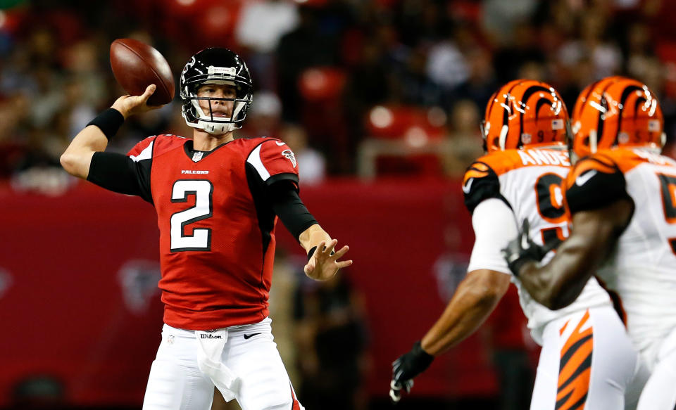 Matt Ryan #2 of the Atlanta Falcons is pressures by Jamaal Anderson #92 and Thomas Howard #53 of the Cincinnati Bengals at Georgia Dome on August 16, 2012 in Atlanta, Georgia. (Photo by Kevin C. Cox/Getty Images)