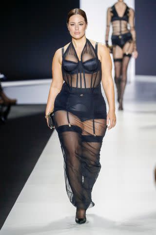 <p>Victor VIRGILE/Gamma-Rapho via Getty </p> Ashley Graham walks the runway at Dolce & Gabbana's spring 2024 fashion show in Milan on Saturday.