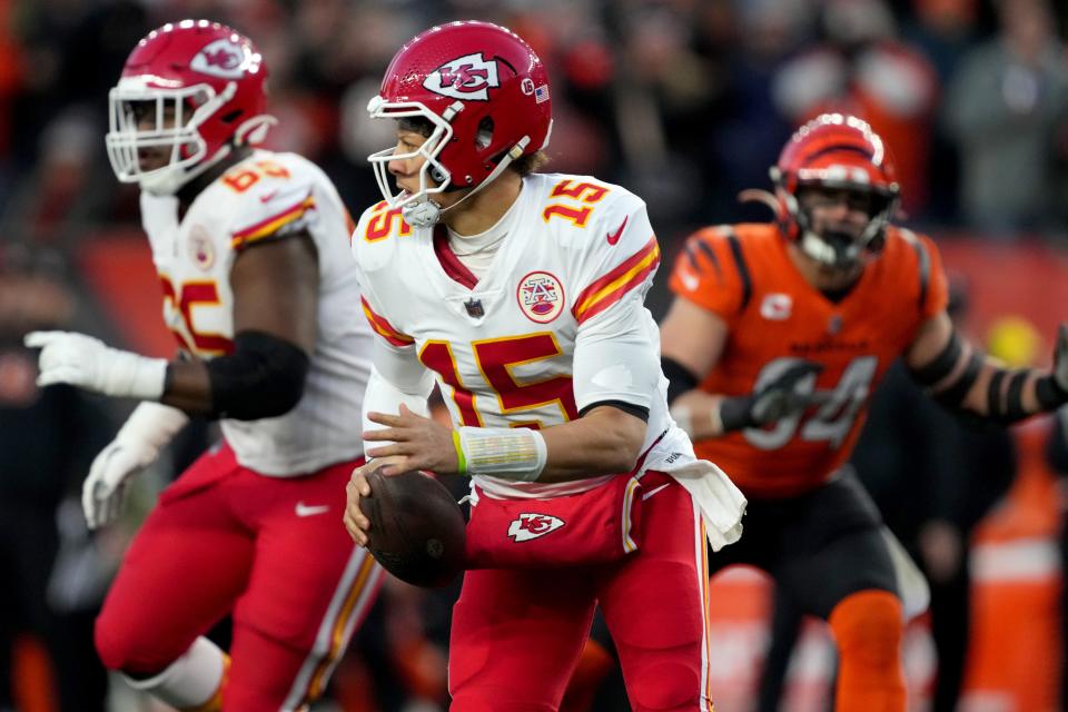 Kansas City Chiefs quarterback Patrick Mahomes (15) runs out of the pocket in the second quarter of a Week 13 NFL game against the Cincinnati Bengals, Sunday, Dec. 4, 2022, at Paycor Stadium in Cincinnati. Mandatory Credit: Kareem Elgazzar-The-Cincinnati Enquirer-USA TODAY Sports