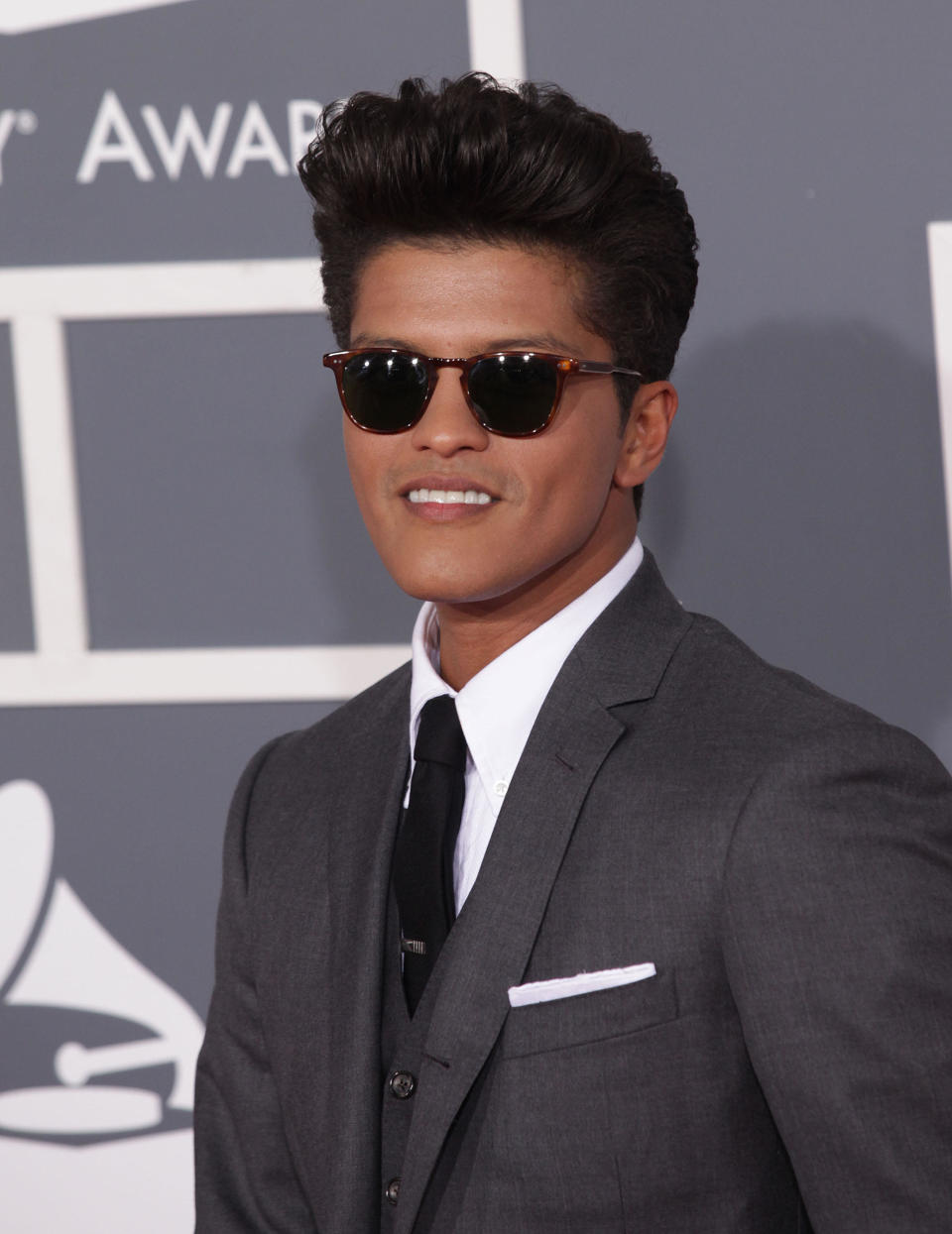 Rumors that the pop star had come out of the closet began after CNN iReport -- a subsection of the media outlet comprising 'citizen journalists' from around the world -- <a href="http://www.towleroad.com/2012/04/bruno-mars-did-not-come-out-of-the-closet.html" target="_hplink">posted a since-removed story</a> that stated, "The famous pop-star Bruno Mars admits his homosexuality," which caused the Mars' name to trend on Twitter.  Nonetheless, Mars' rep called the report "completely fabricated" and "false," <a href="http://www.gossipcop.com/bruno-mars-gay-out-of-closet-homosexual-april-2012/" target="_hplink">according to Gossip Cop</a>.