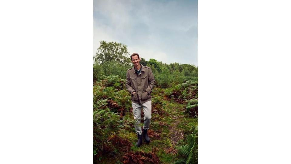 Andy Murray walking through nature