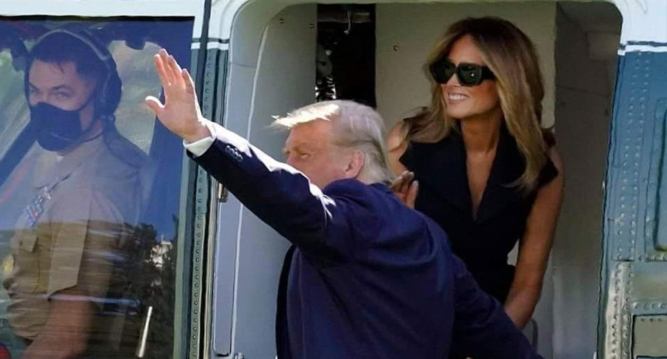 The First Lady of the US and President boarding Marine One.