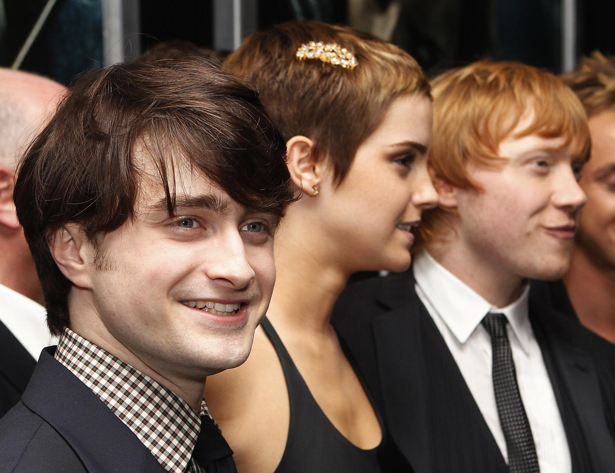 Cast members Daniel Radcliffe (L), Emma Watson and Rupert Grint (R) pose at the premiere of 