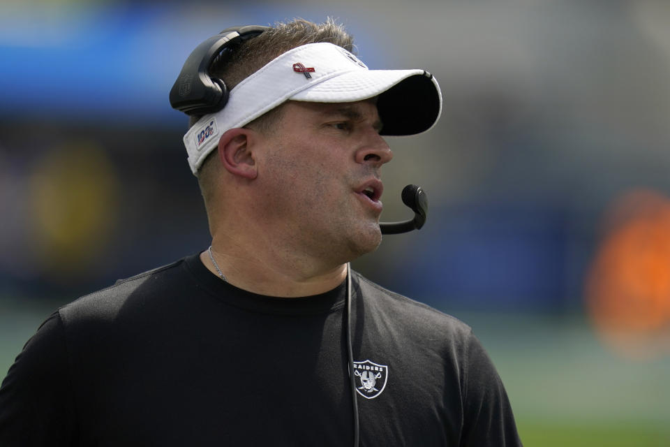 Las Vegas Raiders head coach Josh McDaniels watches from the sideline during the first half of his team's NFL football game against the Los Angeles Chargers in Inglewood, Calif., Sunday, Sept. 11, 2022. (AP Photo/Gregory Bull)