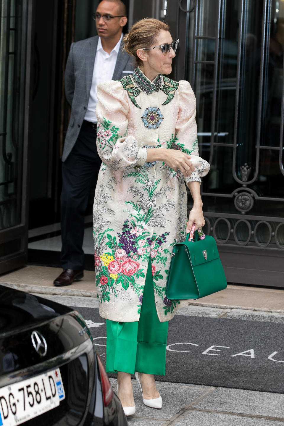 Keeping warm in Paris, the singer dressed in a seriously chic Gucci floral coat back in July 2017. A co-ordinating Dior bag finished the high-fashion ensemble. [Photo: Getty]