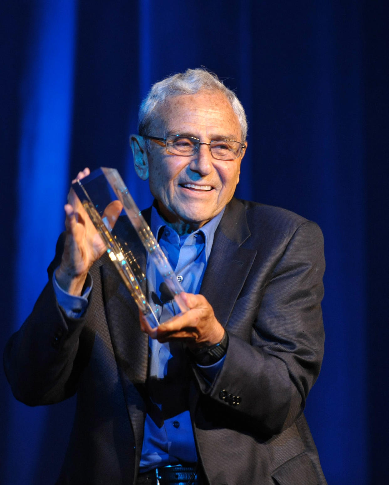 George Shapiro accepts the lifetime of bliss award onstage at the David Lynch Foundation:  A Night of Comedy honoring Shapiro in 2012. (John Shearer / Invision for David Lynch Foundation/AP Images)