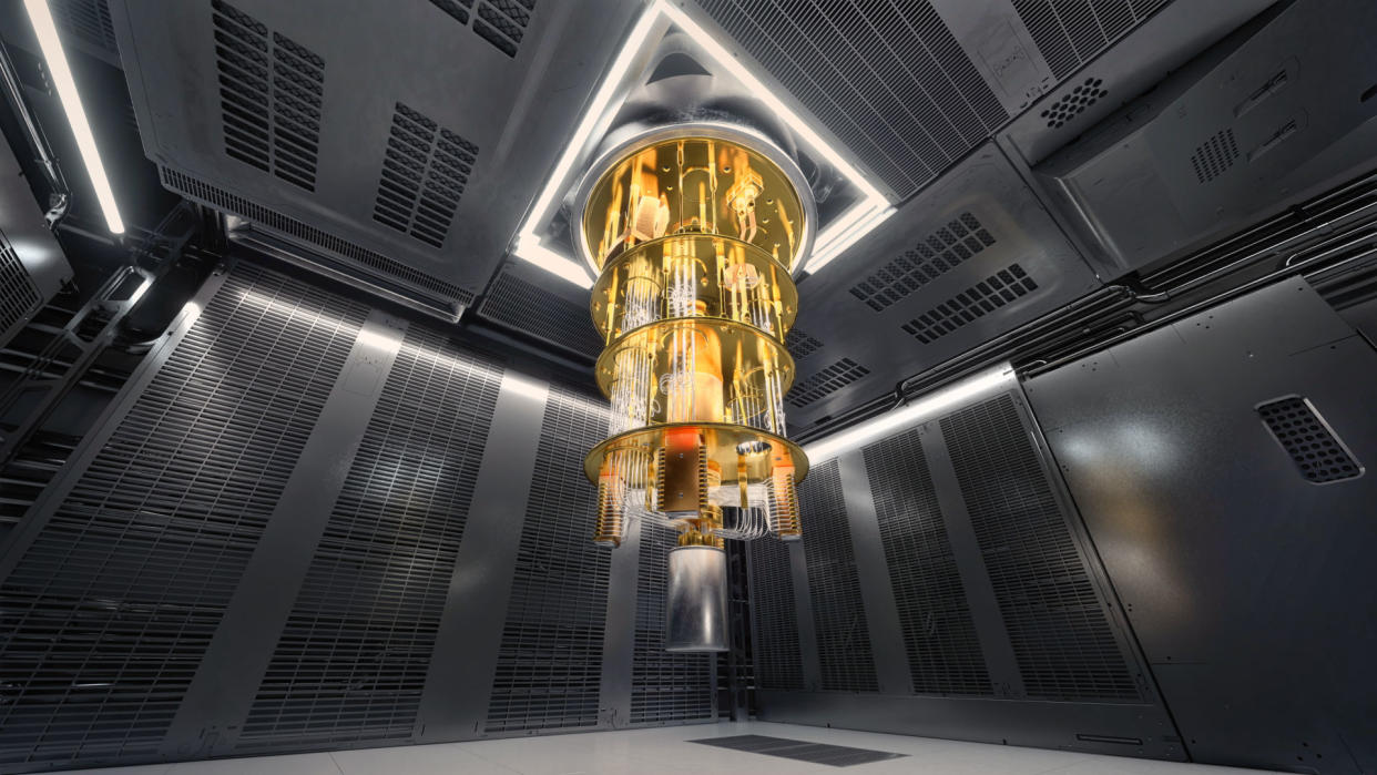  A photo of a quantum computer hanging from the ceiling of a clean room laboratory. 