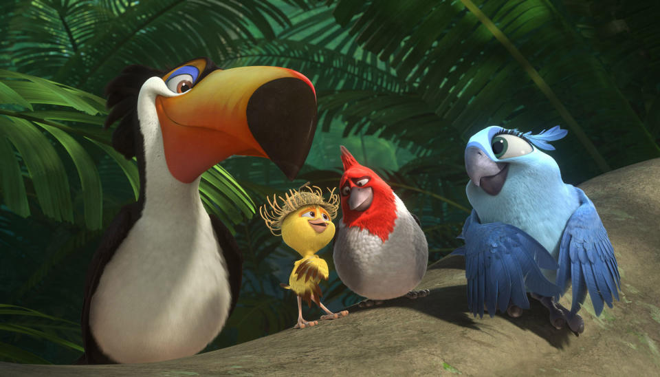 This image released by 20th Century Fox shows, from left, Rafeal, voiced by George Lopez, Nico, voiced by Jamie Foxx, Pedro, voiced by Will.i.am, and Carla, voiced by Rachel Crow in a scene from the animated film "Rio 2." (AP Photo/20th Century Fox- Blue Sky Studios)
