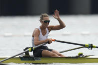 Emma Twigg, of New Zealand reacts after winning the gold medal in the women's rowing single sculls final at the 2020 Summer Olympics, Friday, July 30, 2021, in Tokyo, Japan. (AP Photo/Lee Jin-man)