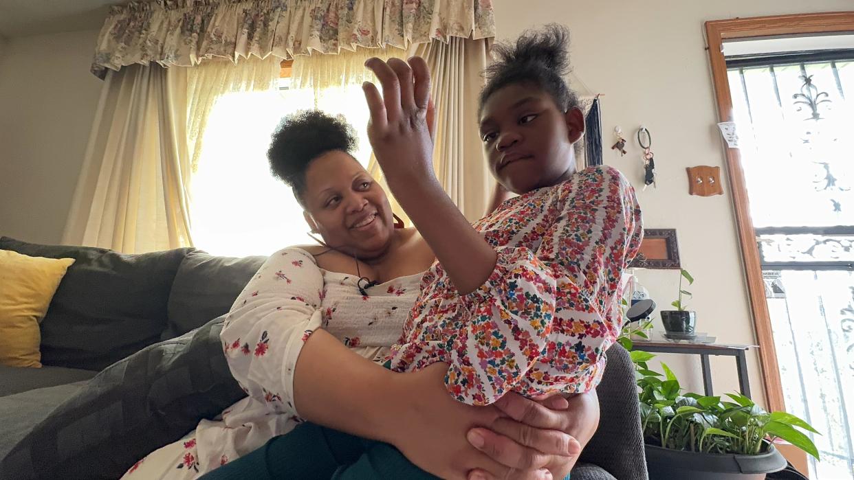 Latasha Bell with her daughter / Credit: Kati Weis, CBS News Colorado