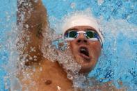 US swimmer Ryan Lochte competes in the men's 400m individual medley heats swimming event at the London 2012 Olympic Games