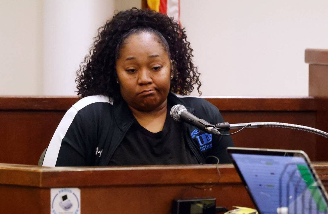 Lashundra Womack describes finding the bodies of her sister, O’Tishae Womack, and niece, Ka’Myria Womack, 10, at their east Fort Worth apartment in 2018 while giving testimony on Monday at the Tim Curry Criminal Justice Center in Fort Worth. Paige Terrell Lawyer is on trial for capital murder in their deaths and could face the death penalty if convicted.