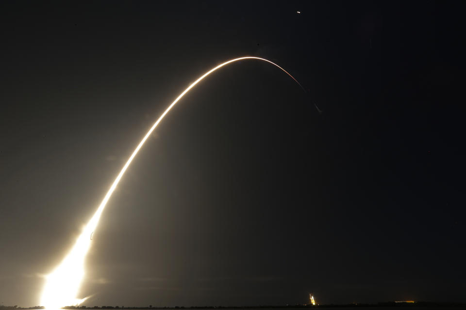 FILE - This time exposure photo shows a SpaceX Falcon 9 rocket, with a payload including two lunar rovers from Japan and the United Arab Emirates, launching from Launch Complex 40 at the Cape Canaveral Space Force Station in Cape Canaveral, Fla., on Dec. 11, 2022. A Japanese company’s spacecraft apparently crashed while attempting to land on the moon Wednesday, April 26, 2023, losing contact moments before touchdown and sending flight controllers scrambling to figure out what happened. (AP Photo/John Raoux, File)
