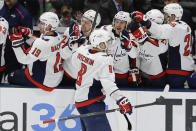 Washington Capitals' Alex Ovechkin (8) celebrates with teammates after scoring during the third period of an NHL hockey game against the New York Islanders Saturday, Jan. 18, 2020, in Uniondale, N.Y. The Capitals won 6-4. (AP Photo/Frank Franklin II)