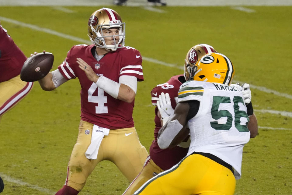 San Francisco 49ers quarterback Nick Mullens (4) passes against the Green Bay Packers during the second half of an NFL football game in Santa Clara, Calif., Thursday, Nov. 5, 2020. (AP Photo/Tony Avelar)