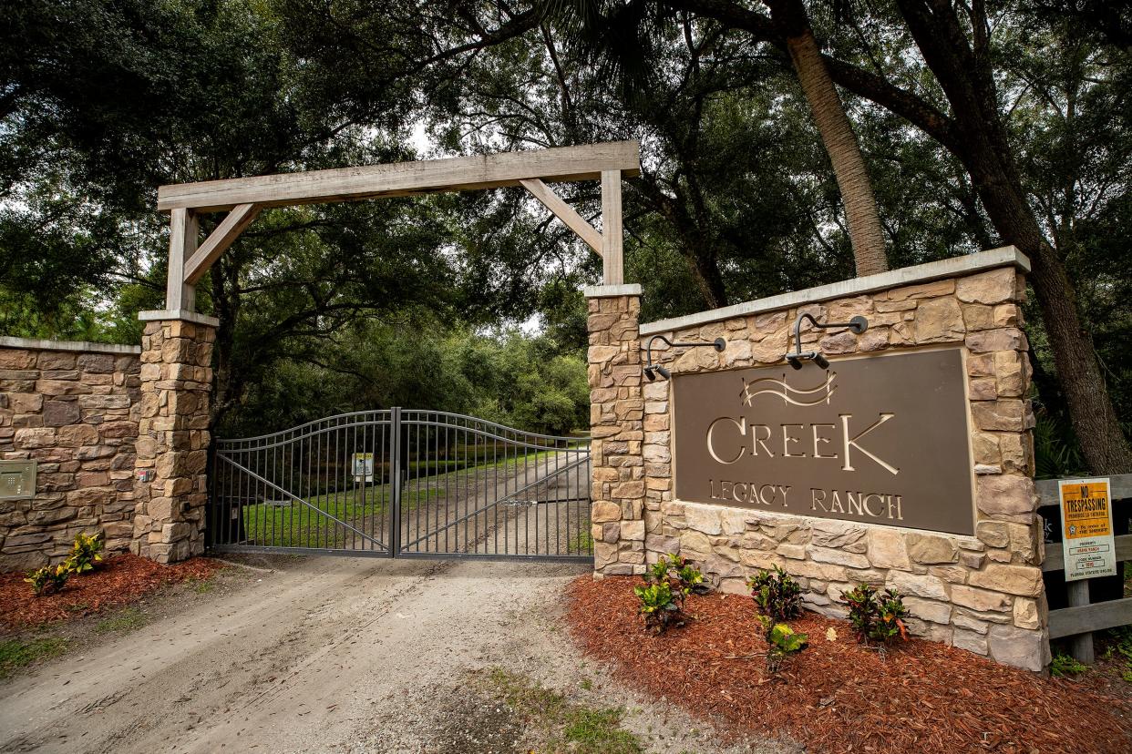 Entrance to the Creek Ranch off Lake Hatchineha Road. The owners of the ranch, who once planned to build a subdivision on nearly 600 acres while preserving 587 acres, have agreed to sell the land to the Florida Forever program. The entire ranch will now be preserved, possibly as a wildlife management area, and incorporated into the Florida Wildlife Corridor.
